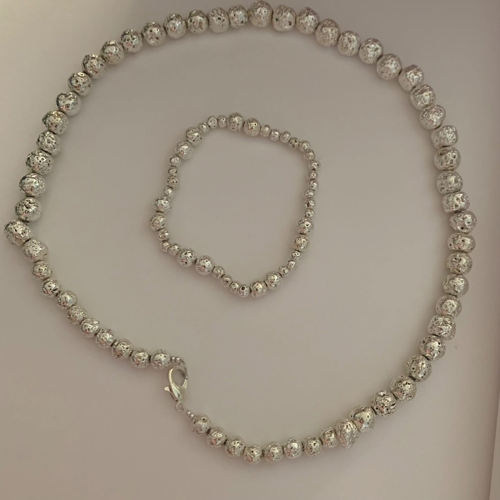 Bead for neck and wrist bracelet